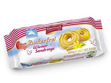 Wiener Sandringe suikervrij 3100. Ingrediënten: TARWEBLOEM, suiker, palmvet, BOTERVET, HEEL EI, bourbon vanillepoeder, MAGERE MELKPOEDER, SOJAmeel, maïszetmeel, glucose-fructosestroop, zout Kan sporen van soja en noten bevatten.