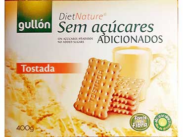 Tostada natuur koekjes 40016. Ingredienten: Tarwemeel 66%, Zoetstof maltitol, zonnebloemolie met een hoog oliezuurgehalte 9,5%, voedingsvezel, gemoute, tarwebloem, 
						rijsmiddel (natriumbicarbonaat en ammoniumzuurcarbonaat), emulgator (soja-lecithine), vanille aroma, antioxidant Metabifliet. Kan deeltjes van noten en melk bevatten.