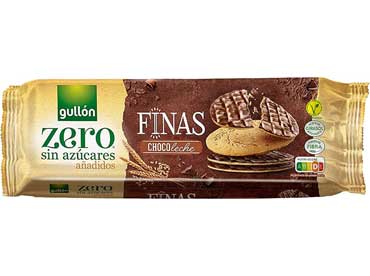 Finas choco leche biscuit sans sucre 40034. Chocolat au LAIT avec édulcorant (édulcorant (maltitol), beurre de cacao, LAIT en poudre, pâte de cacao, émulsifiant (lécithine de SOJA), arôme), flocons d'AVOINE, farine de BLÉ, édulcorant (maltitol), huiles et 
						graisses végétales (huile de cacao et de tournesol à haute teneur en teneur en acide oléique), son de BLÉ, fibres végétales, gélifiant (gomme arabique), agents levants (carbonate acide de sodium, carbonate acide d'ammonium), sel, émulsifiant (lécithine de SOJA), arôme naturel, antioxydant 
						(extrait riche en tocophérols). Peut contenir des traces de noix.